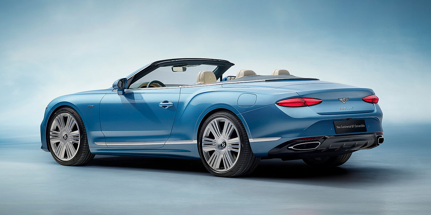 Bentley Lisboa New Bentley Continental GTC Azure convertible rear view in Light Windsor blue paint with 22 inch ten spoke wheels and chrome exterior details