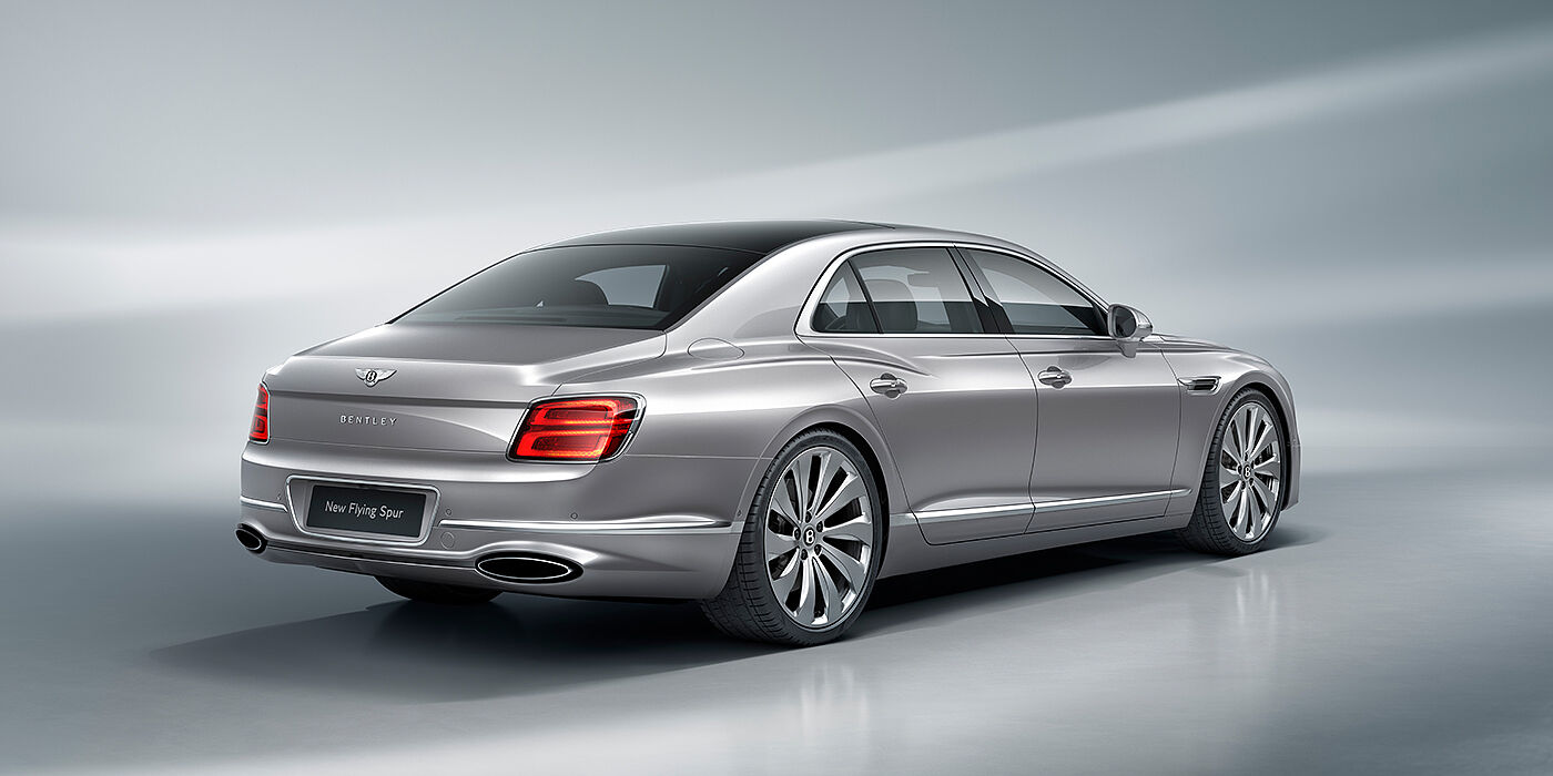 Bentley Lisboa New Bentley Flying Spur sedan rear view in Silverlake paint with ten spoke wheels and chrome matrix grille